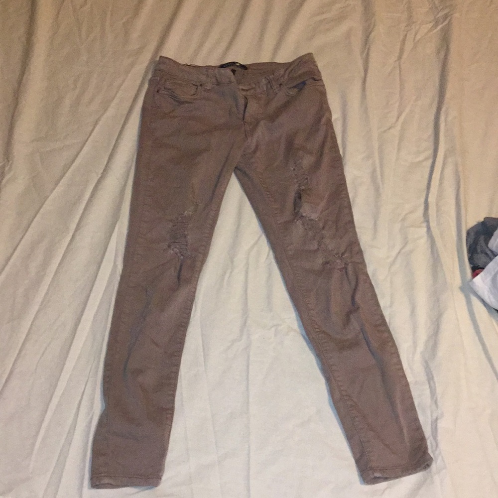 Maroon ripped jeans